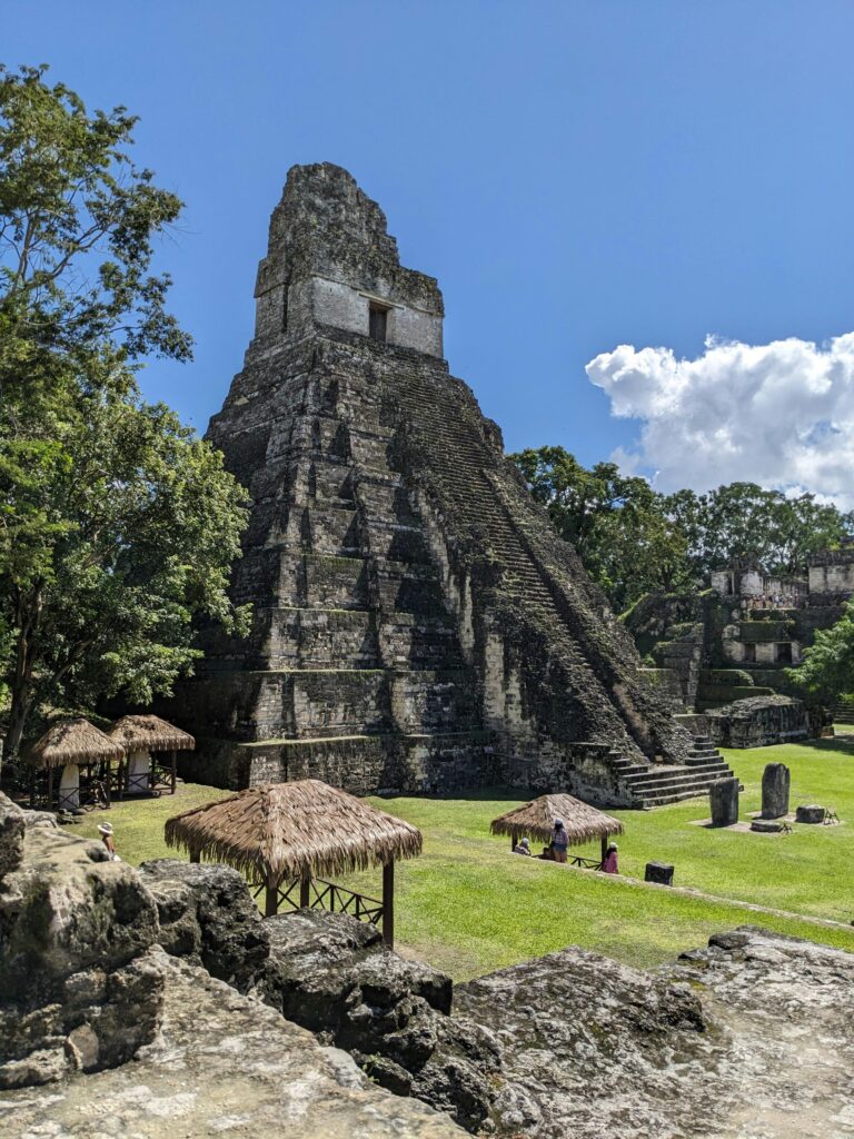 Discover the iconic Temple of the Great Jaguar at Tikal, nestled amidst lush greenery in Guatemala.